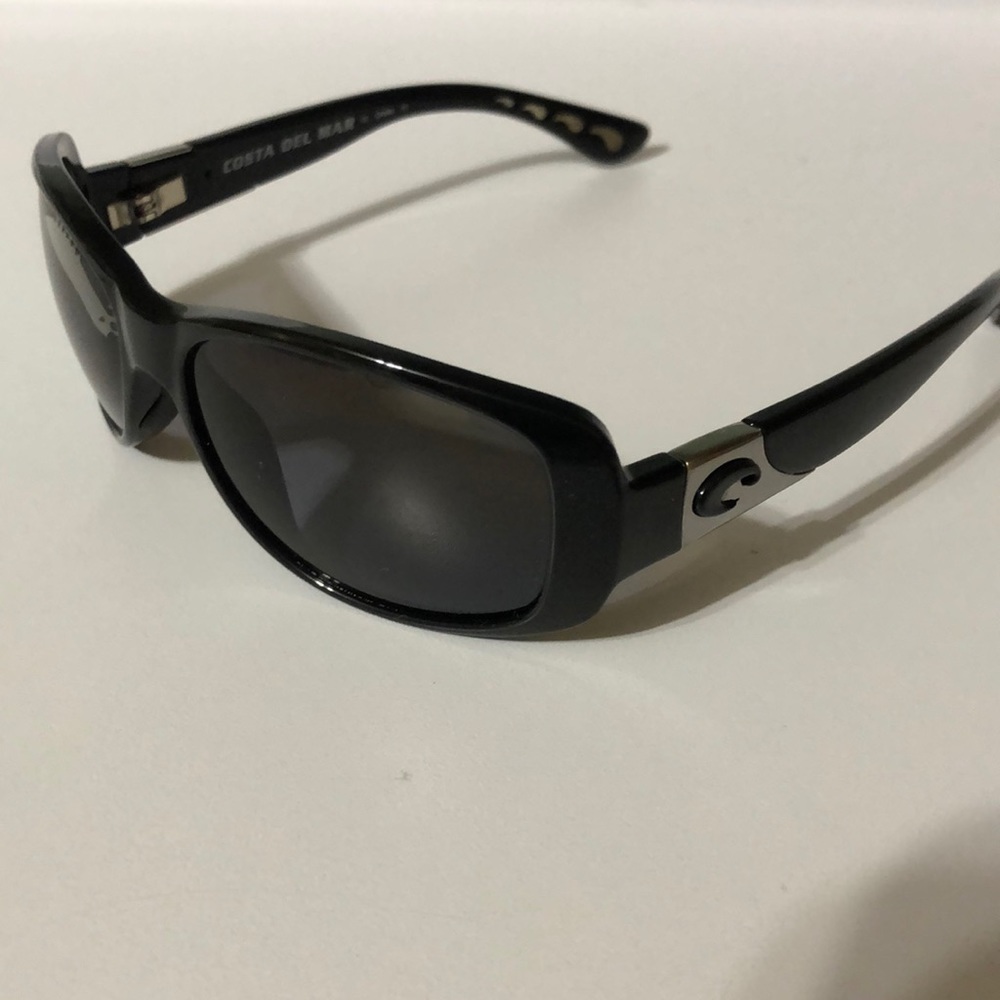 Costa Del Mar sunglasses, damaged lenses